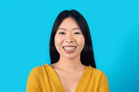 Beautiful Asian Woman Posing Over Blue Background Stock Image Image