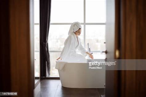 water filling tub photos and premium high res pictures getty images