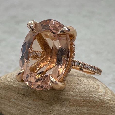 oval morganite statement ring with diamond shank and side halo ls5394 laurie sarah