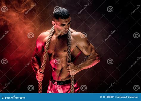 Strong Man With Rope Stock Image Image Of Athletic 101938391