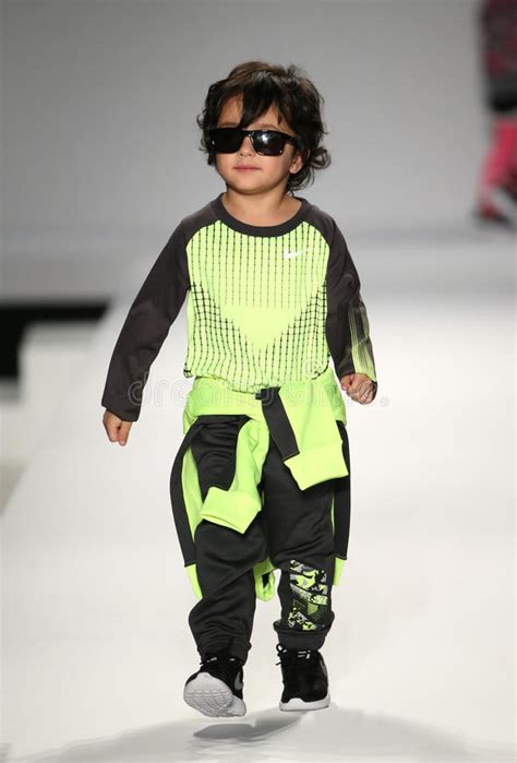A Model Walks The Runway At The Nike Levi S Kids Fashion Show During