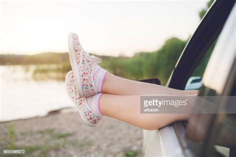 Woman Feet Out Of Car Window Photos And Premium High Res Pictures