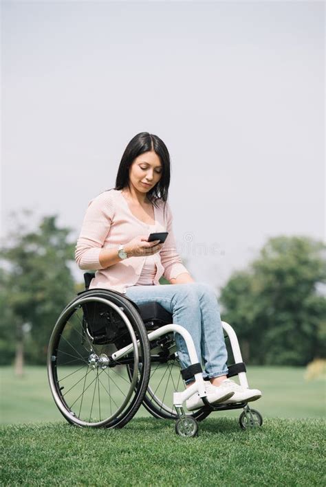 Pretty Disabled Woman In Wheelchair Using Stock Image Image Of Plants Clear 203921293