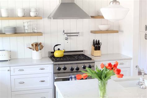 Enhance a farmhouse kitchen's inherently cozy and relaxed vibe with a banquette like the one in this setup from heidi caillier. Scandinavian Farmhouse Kitchen Reveal | A Nod to Navy