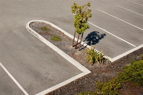 Commercial Parking Lot Curb Extruders Limitless Paving Concrete