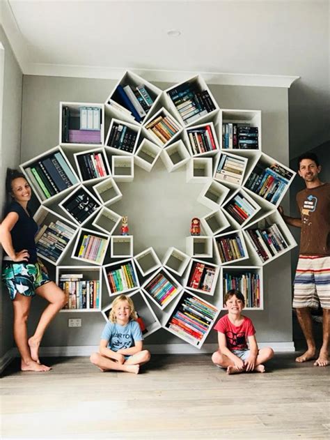 I know, it's been a long time coming but so was the bookcase! DIY Flower Bookshelf - Vuing.com