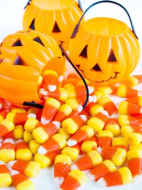 Premium Photo Candy Corn Candies Falling Out Of Halloween Treat Bag
