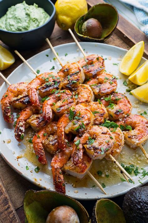 Shrimp is soaked in a four ingredient marinade then threaded onto skewers and grilled in a flash. Cajun Butter Garlic Grilled Shrimp with Cilantro Lime ...