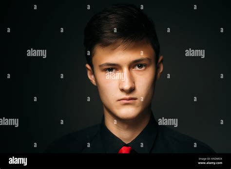 Portrait Young Guy On A Dark Studio Stock Photo Alamy
