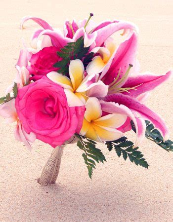 Our package includes hawaiian wedding arch, two color flower pathway, four decorated tikis, plus, eight chairs with sashes and flowers in your color theme. Wedding Bouquets by Sweet Hawaii Wedding