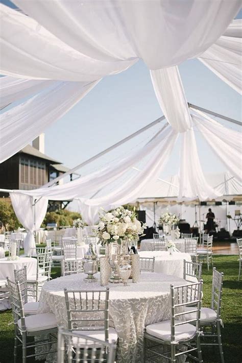 Check out this black, white and silver wedding reception decor and see more inspirational photos on theknot.com. 50 Silver Winter Wedding Ideas for Your Big Day | Deer Pearl Flowers - Part 2