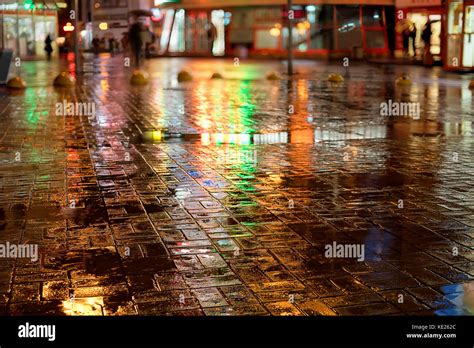 Rainy Night In The City Wet Street Colored Lights Reflection And