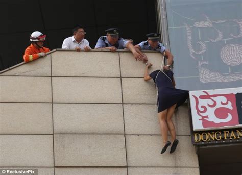 Beijing Chinese Police Officer Saves The Life Of A Suicidal Woman By