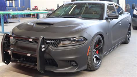 It's a brawny family hauler with butch looks, and a roster of powerful engines. Police can now buy an armored AWD Dodge Charger SRT ...
