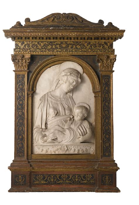 An Italian Marble Relief Of The Madonna And Child After A Composition