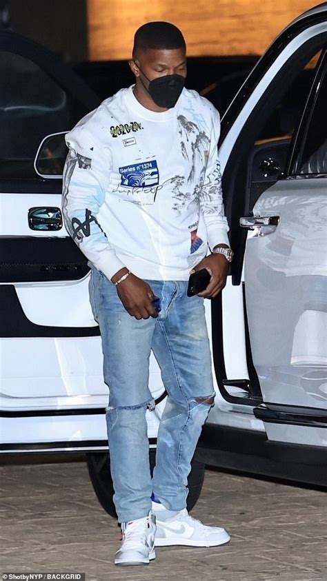 Jamie Foxx Dresses Down In Ripped Jeans And A Crewneck Sweatshirt