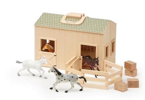 Chunky handles let you take this little bit of young macdonalds will enjoy down on the farm fun with this fully assembled, wooden barn. Amazon.com: Melissa & Doug Fold and Go Stable: Melissa ...