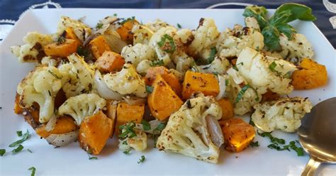 What's the best way to cook sweet potatoes with broccoli? Roasted Cauliflower and Sweet Potatoes - Just~One~Donna
