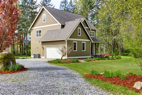 Build your own diy sidewalk for curb appeal with pavers and limestone gravel. How To Keep A Gravel Driveway From Washing Out - A ...