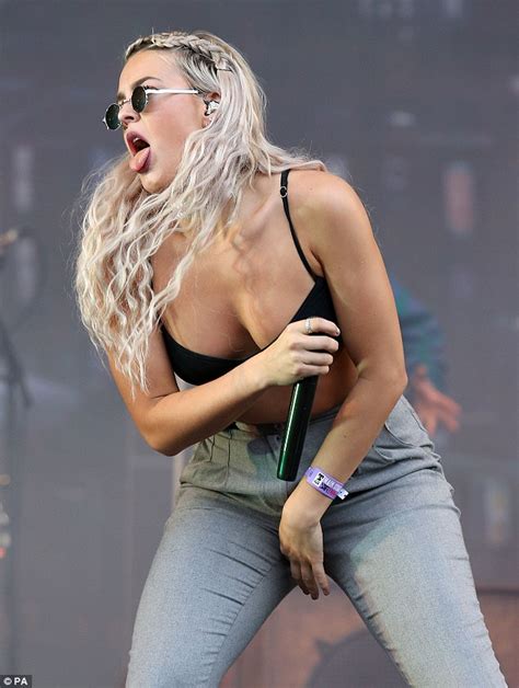 Anne Marie Flashes The Flesh In Black Bra As She Performs At T In The