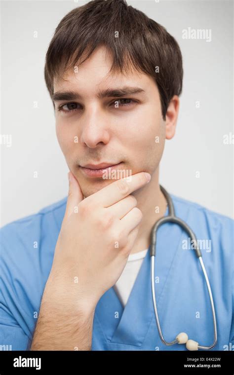 Nurse Looking At The Camera Thinking Stock Photo Alamy