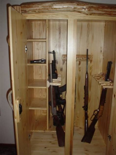 Responsible gun ownership is an often overlooked requirement that should come with acquiring guns. Custom log gun cabinet from K&A Log Furniture www ...