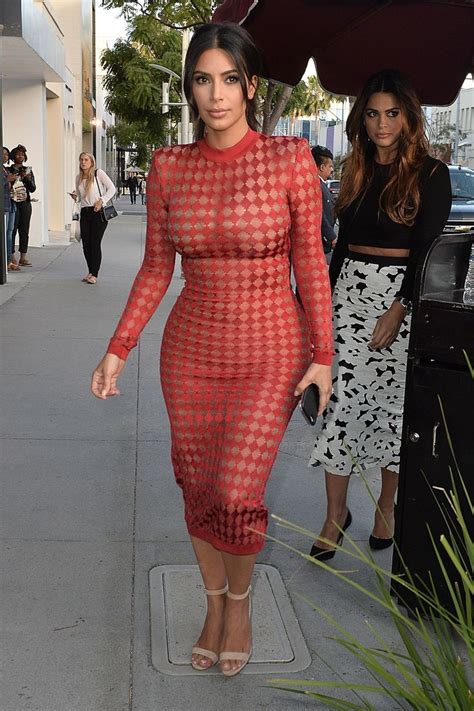 Kim Kardashian Rocks A Gucci Pantsuit Without A Top In La