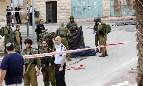 Israeli Soldier Is Filmed Shooting Dead Wounded Palestinian Attacker World News The Guardian