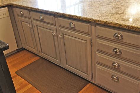 Avery of holland avenue needed one quart of pure white to do two coats on the upper cabinets, and one quart of duck egg blue to do two coats on the lowers. Cabinet Painting Nashville TN | Kitchen Makeover