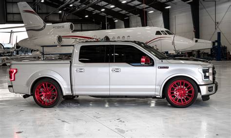 Lowered Black Top Ford F150 On Red Custom Wheels — Gallery