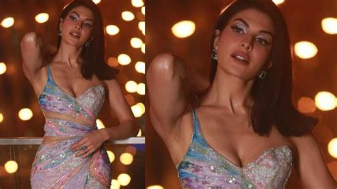 Jacqueline Fernandez Flaunts Her Cleavage In Multi Coloured Gown At