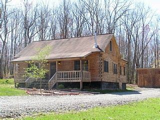 These two bedroom cabins can accommodate up to six people. WV Luxury Log Cabin Sleeps 12 With Private Hot Tub and ...