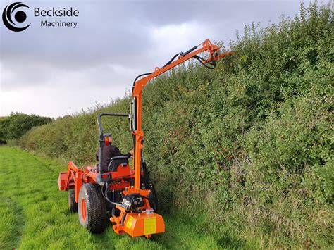 Tackling A High Hedge With A Compact Tractor Hedge Cutter