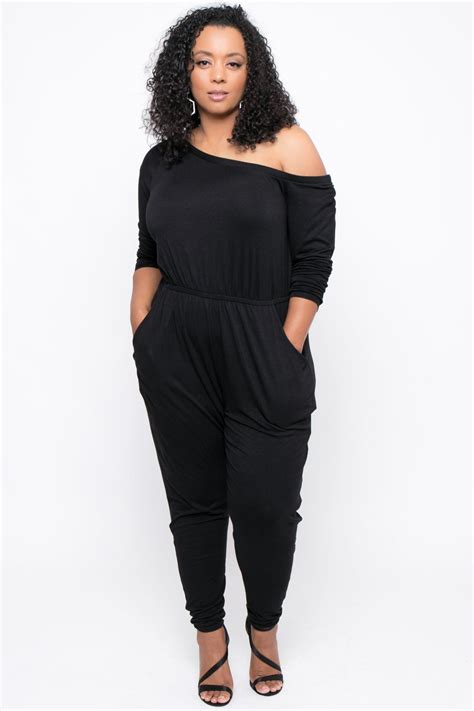 this plus size stretch knit jumpsuit features an of the shoulder neckline long sleeves