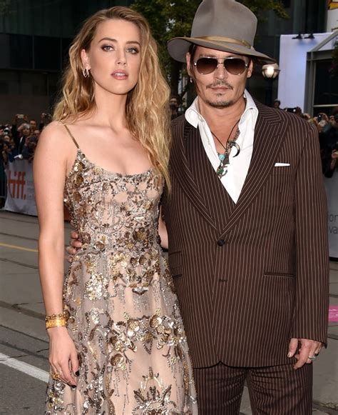 Amber Heard Puts On Flirty Display With Dashing Co Star As She Makes