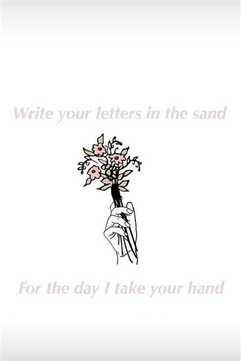 a hand holding a bouquet of flowers with the words write your letters in the sand for the day i