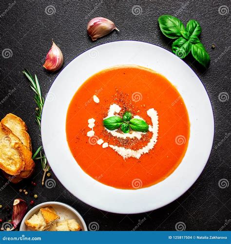 Tomato Soup With Herbs On Black Slate Table Fresh Homemade Cream Of