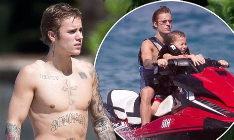 Shirtless Justin Bieber Shows Off Physique As He Hits Barbados With Brother Daily Mail Online