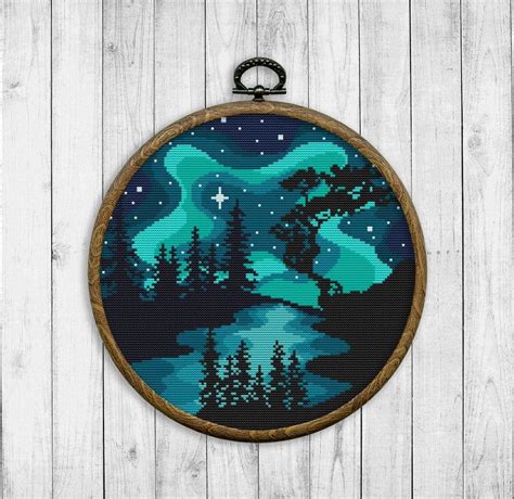 (dmc alternates are 3777 3013 3012 921 3828 610 646 white 310) stitch count is 186w x 153h. Northern Lights Cross Stitch Pattern, Nature Counted Cross ...