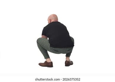 Rear View Man Sitting Squatting On Stock Photo Shutterstock