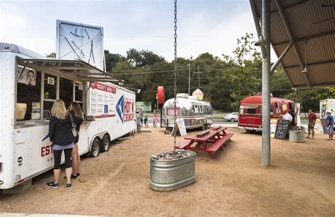 Gorgeous fairy lights hang up overhead illuminating the area at night. 7 Food Truck Parks to Visit in Austin, Texas