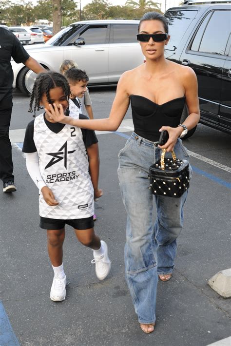 kim kardashian flips off the paparazzi after scolding son saint for doing the same