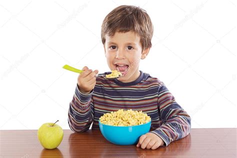 Child Eating Breakfast Stock Photo By ©gelpi 9431965