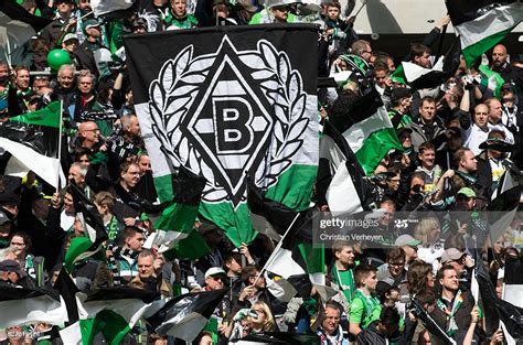 Mönchengladbach, commonly known as borussia mönchengladbach, mönchengladbach or gladbach, is a. Fans of Borussia Moenchengladbach support their team with ...