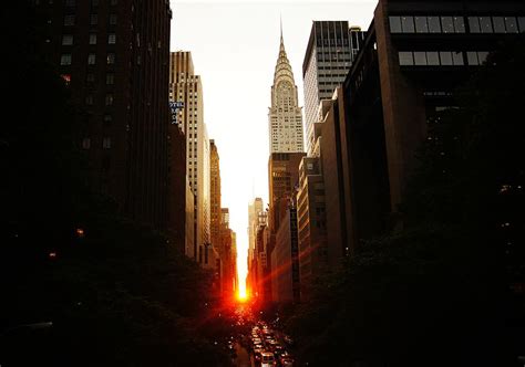 Manhattanhenge Sunset Over The Heart Of New York City Photograph By