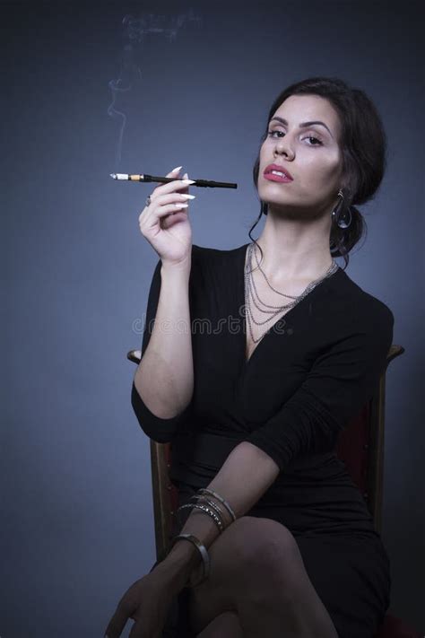 Classy Young Woman Smoking Stock Photo Image Of Seductive 74485396
