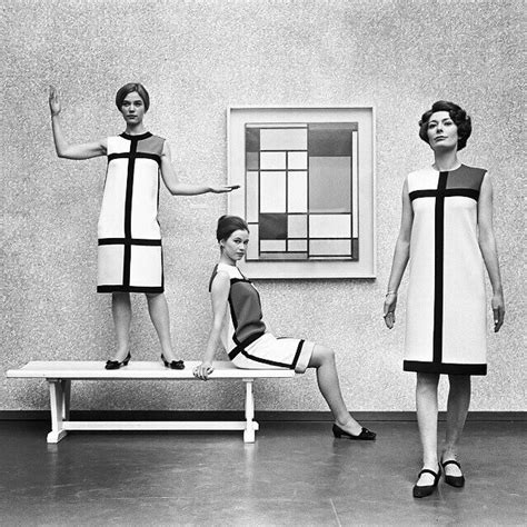 Yves Saint Laurents De Stijl Collection In Front Of A Piet Mondrian Composition