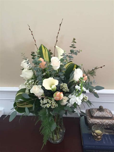 Featuring a fold away design that is made to meet your space needs while providing durable and efficient furniture. Vase Arrangements (Sympathy) - Fleur-tatious Floral Design