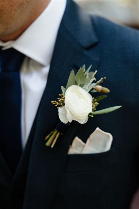 Classic White Boutonniere With Navy Suit By La Rue Floral Photography