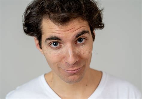 Funny Face Portrait Of Young Man Making Amusing Gestures Stock Image